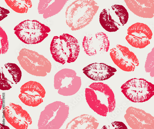 Seamless Pattern of Red and Pink Lipstick Kiss Marks on a Light Background