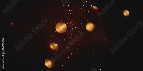 Golden abstract bokeh on black background. Holiday concept