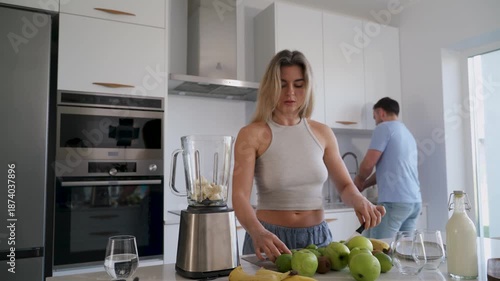  Couple Preparing Healthy Smoothie Together in Bright Modern Kitchen