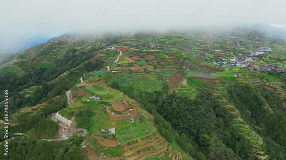 Stockvideon Rising aerial through heavy mountain mist, revealing the ...