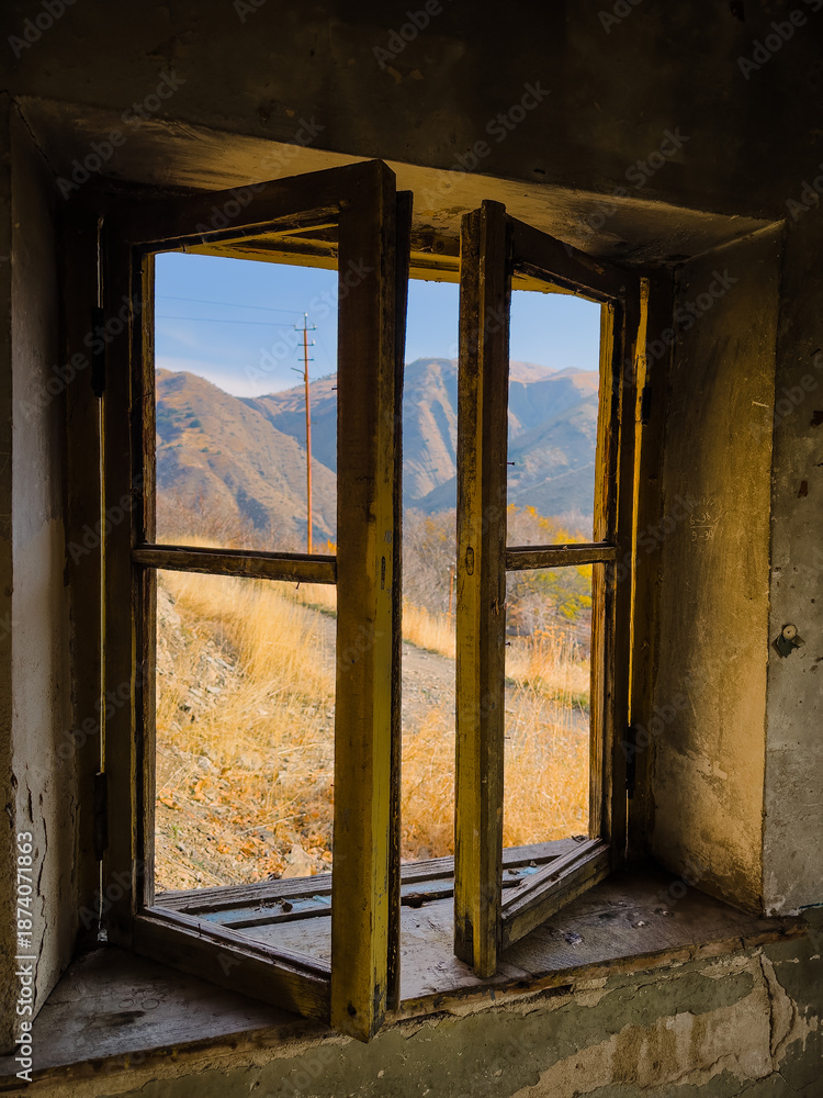 Fototapeta premium A window overlooking the mountains of Armenia, Yerevan. High quality photo