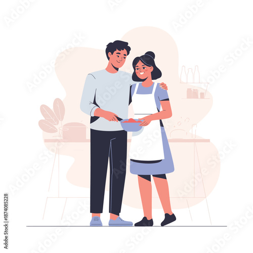 Happy couple cooking together in a modern kitchen with a loving embrace