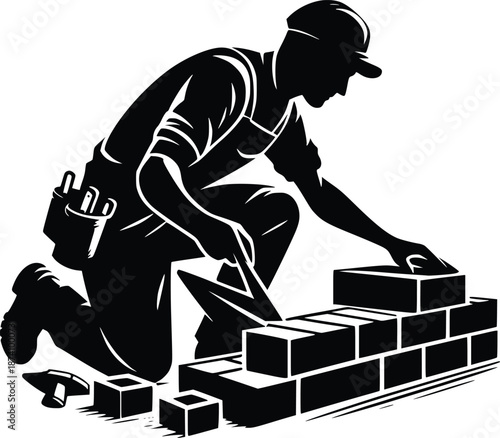 Worker laying bricks