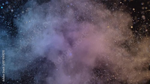 Dynamic purple explosion with glittering particles in motion against dark background. 4K video