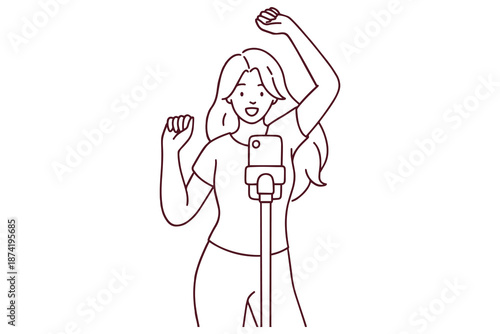 Black and white outline of a cheerful woman filming a dance for social media content. Young creator using her phone to capture movement and joy at home.