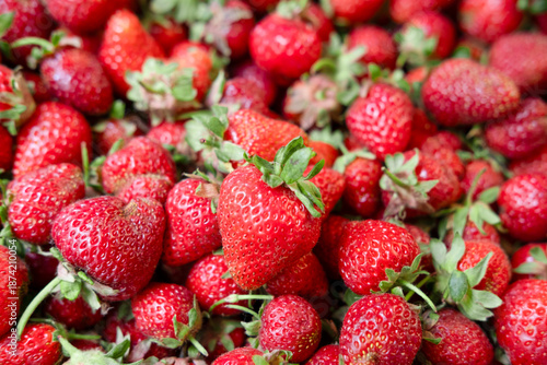 Bright background of colorful strawberries