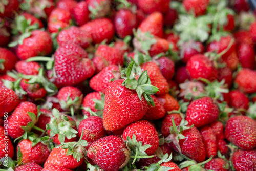 Bright background of colorful strawberries