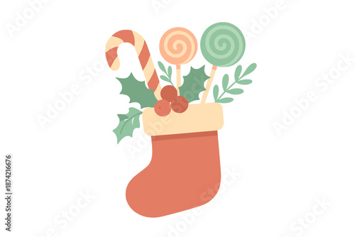 Colorful candy and greenery arranged in a festive stocking for holiday celebration during winter season