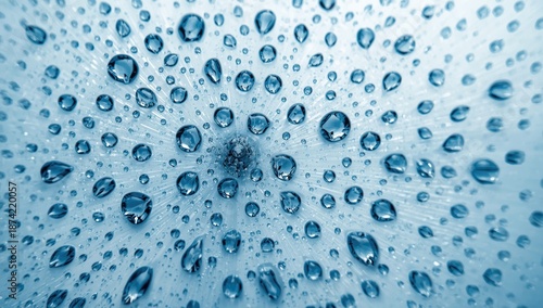 Textile or paper with blue water droplets pattern, used as a neutral background for design projects