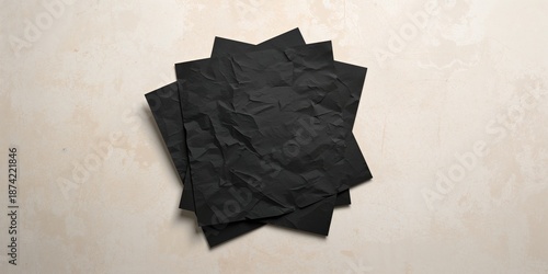 Black paper sheets with fol...