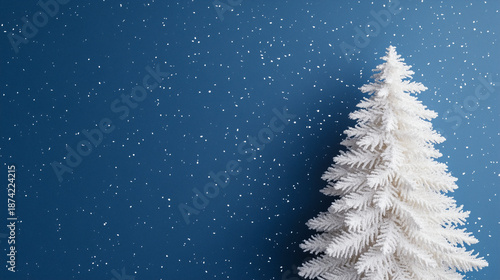 Christmas tree on blue background, palette of matte cream, graphite gray, and vivid cobalt, modern abstract holiday poster design