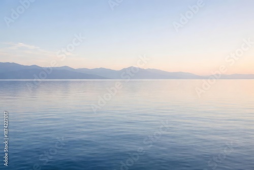 Flat water surface with far...
