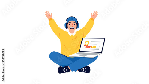 Excited young man listening to music while working on laptop