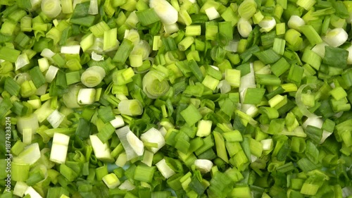 Finely chopped green onions, top view, natural background