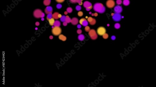 Soft falling colorful bokeh circles creating a dreamy and festive animation background