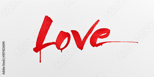 Red watercolor word love painted on white textured paper.
