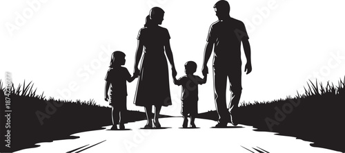 Silhouette of happy family walking together on a path