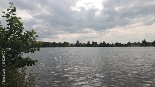 Scenic trais horloffer lake view with sun glimmering on water