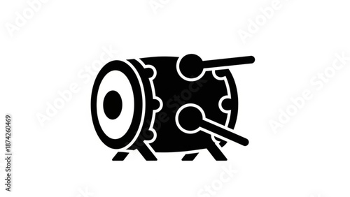 Drum Being Played with Drumstick Isolated on White Background