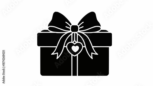 Black Gift Box with Heart Ornament and Ribbon.