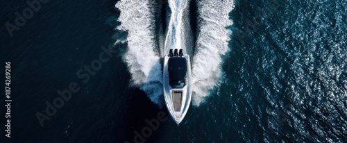Wallpaper Mural The Yacht Cutting Through Deep Blue Ocean Water Leaving Dramatic Sunlit White Wake Torontodigital.ca