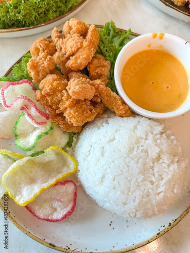Fried Chicken Meal with Rice and Crackers