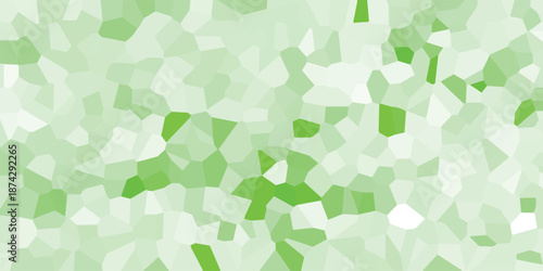 Geometric mosaic pattern of vibrant green and white crystalline shapes creating a fresh, natural, and lively background for digital design and creative projects