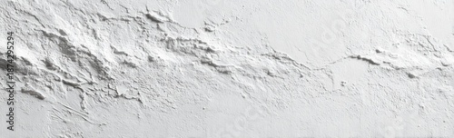 An abstract, textural black and white image presents rough, layered ridges across a white surface