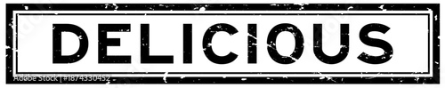Quadro su tela Grunge black delicious word square rubber seal stamp on white background