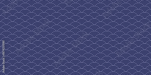 Seamless vector pattern with Japanese waves on blue background. Traditional ocean inspired design for textile printing and surface decoration.