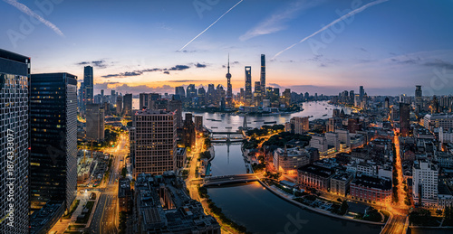 Photos Majestic aerial view of the Shanghai skyline and financial district along the river at sunrise