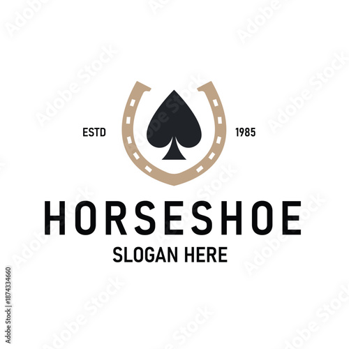 Vintage Logo featuring a Combination of a Golden Horseshoe and a Black Spade Symbol.