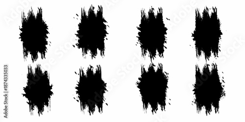 Abstract brush strokes A collection of dark irregular ink blots on white
