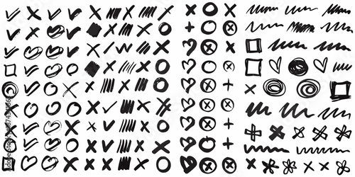 An assortment of abstract black and white scribbles shapes and symbols