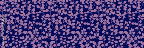 Seamless vector floral pattern with elegant violet flower silhouettes on a deep navy background. Stylish botanical design for textiles, wallpaper, and packaging