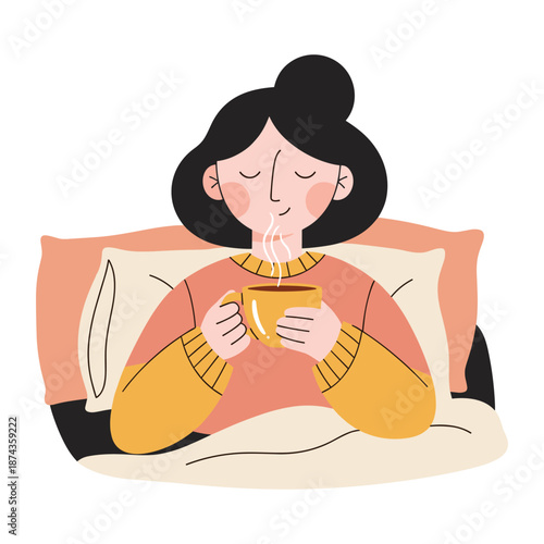 Person in yellow sweater drinking hot beverage in bed with pink pillow woman