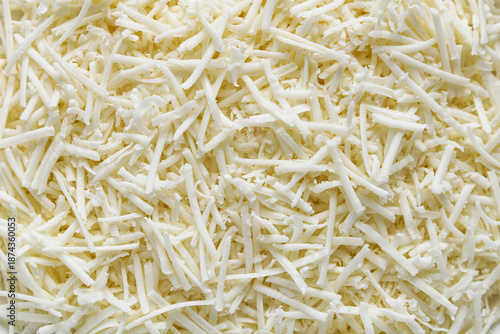 Fotografía Full-frame close-up of shredded cheese, highlighting fine strands and rich dairy texture