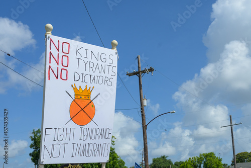 No Kings, No Tyrants, No Dictators - Fight Ignorance, Not Immigrants Sign at No Kings March in New Orleans on June 14, 2025