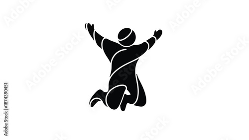 Silhouette of a person jumping with arms raised in celebration