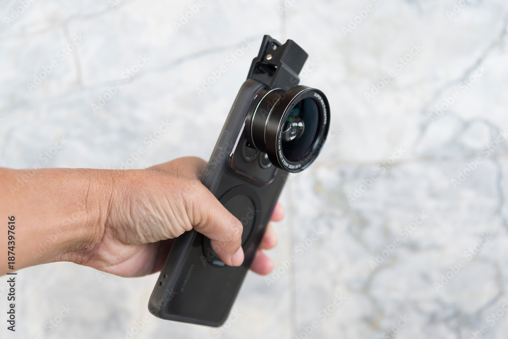 Fototapeta premium Mobile phone extra external lense for smartphone 