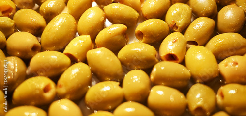 Photography green olives texture. food background