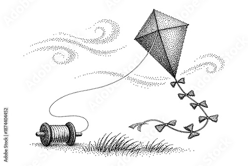 Dotted style kite with string and spool flying in the breeze