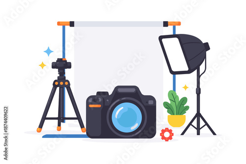 Photography studio setup with camera, tripod, and lighting equipment