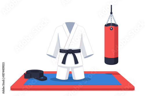 Martial arts training set on mat with punching bag and karate uniform