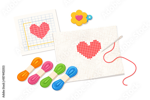Cross stitch embroidery design with heart pattern and colorful threads