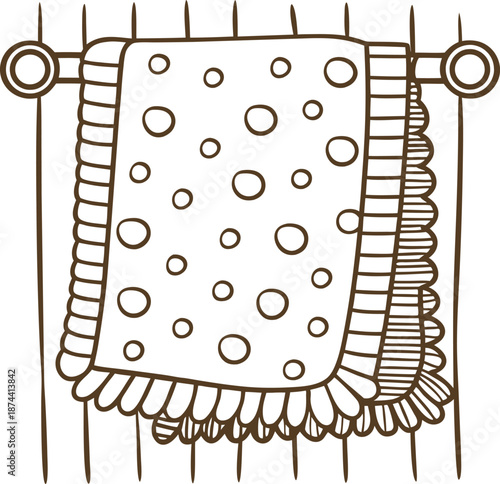 Draped decorative blanket with polka dots hanging on rack, cozy textile design