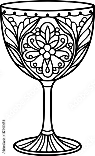 Decorative wine glass with intricate floral and leaf pattern, vintage goblet design