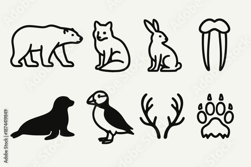 Arctic Animal Icons. Arctic Fauna set in outline vector style: polar bear, arctic fox, snow hare, walrus tusks, seal silhouette, puffin bird, caribou antlers, icy paw print