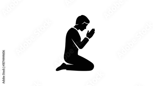 Silhouette of a man kneeling and praying with hands clasped together.