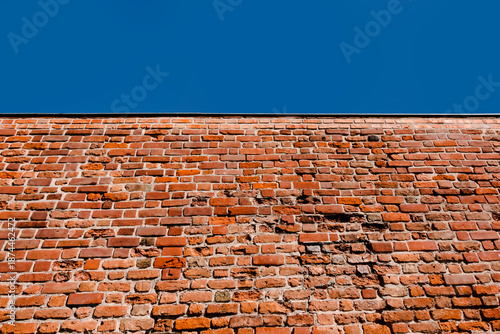 Cuadro en lienzo Fragment of historic stone medieval city wall in Poznań Greater Poland in Poland